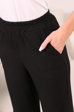 Прямые чёрные трикотажные брюки с карманами Wisell(фото3)