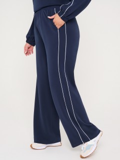 Брюки трикотажные тёмно-синие с карманами Dora(фото4)