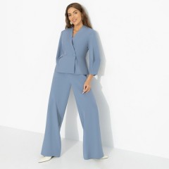 Костюм-двойка голубой с брюками Charutti(фото4)