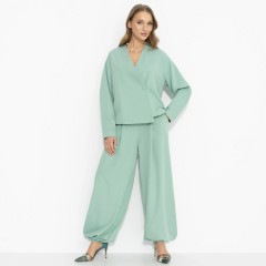 Костюм-двойка мятного цвета с брюками Charutti(фото2)