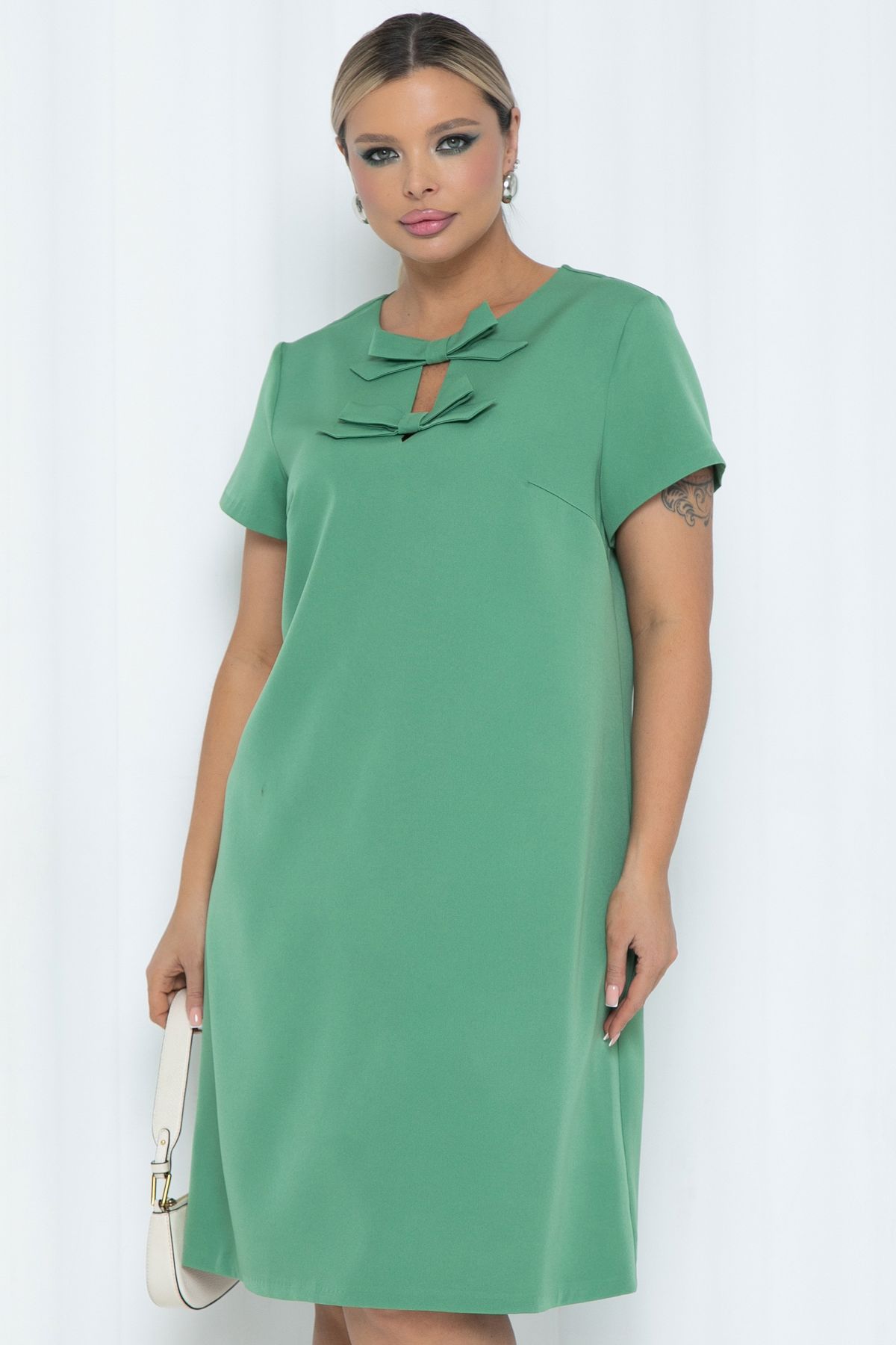 Платье А-силуэта зелёное с декором бантики Agata