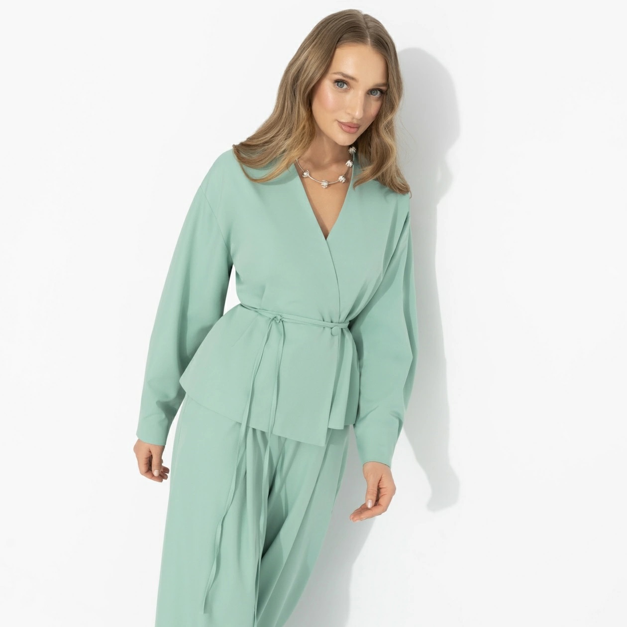 Костюм-двойка мятного цвета с брюками Charutti(фото3)