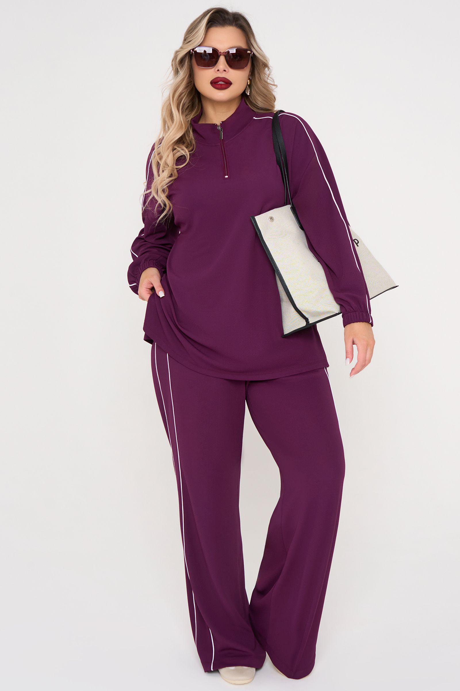 Брюки трикотажные с карманами сливового цвета Dora