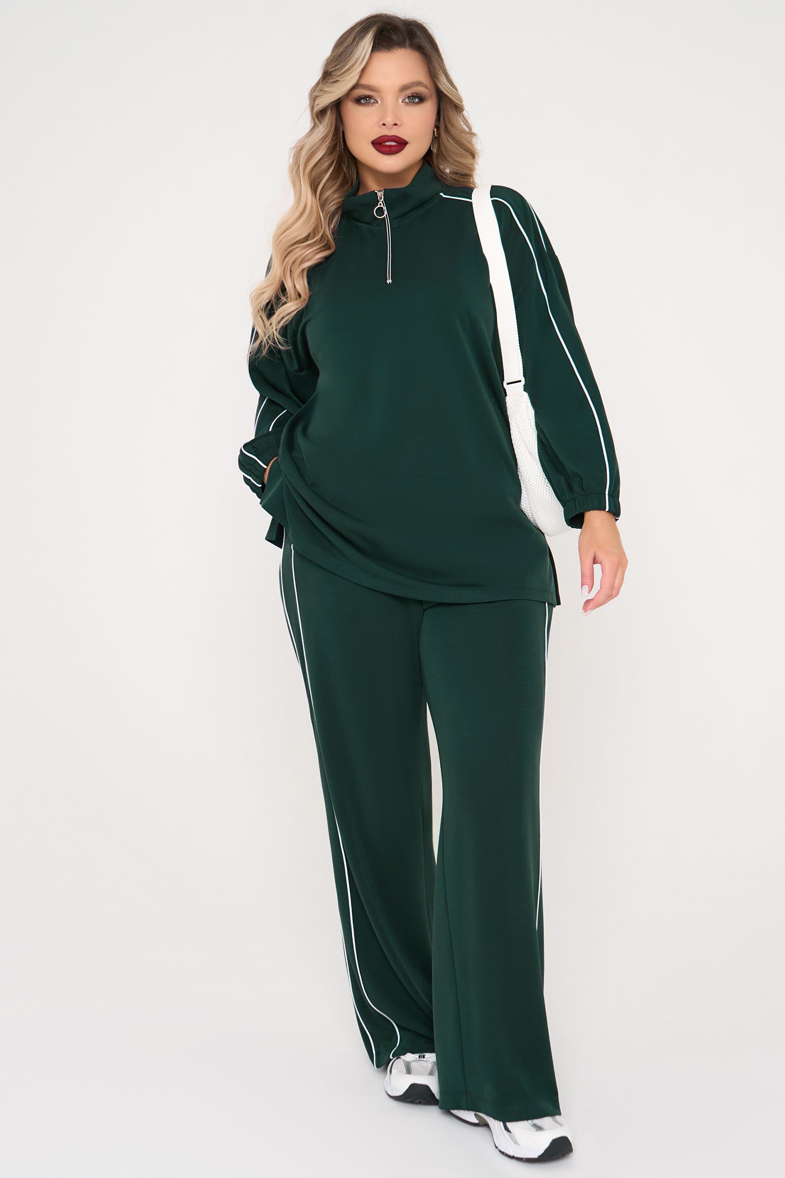 Брюки трикотажные тёмно-зелёные с карманами Dora