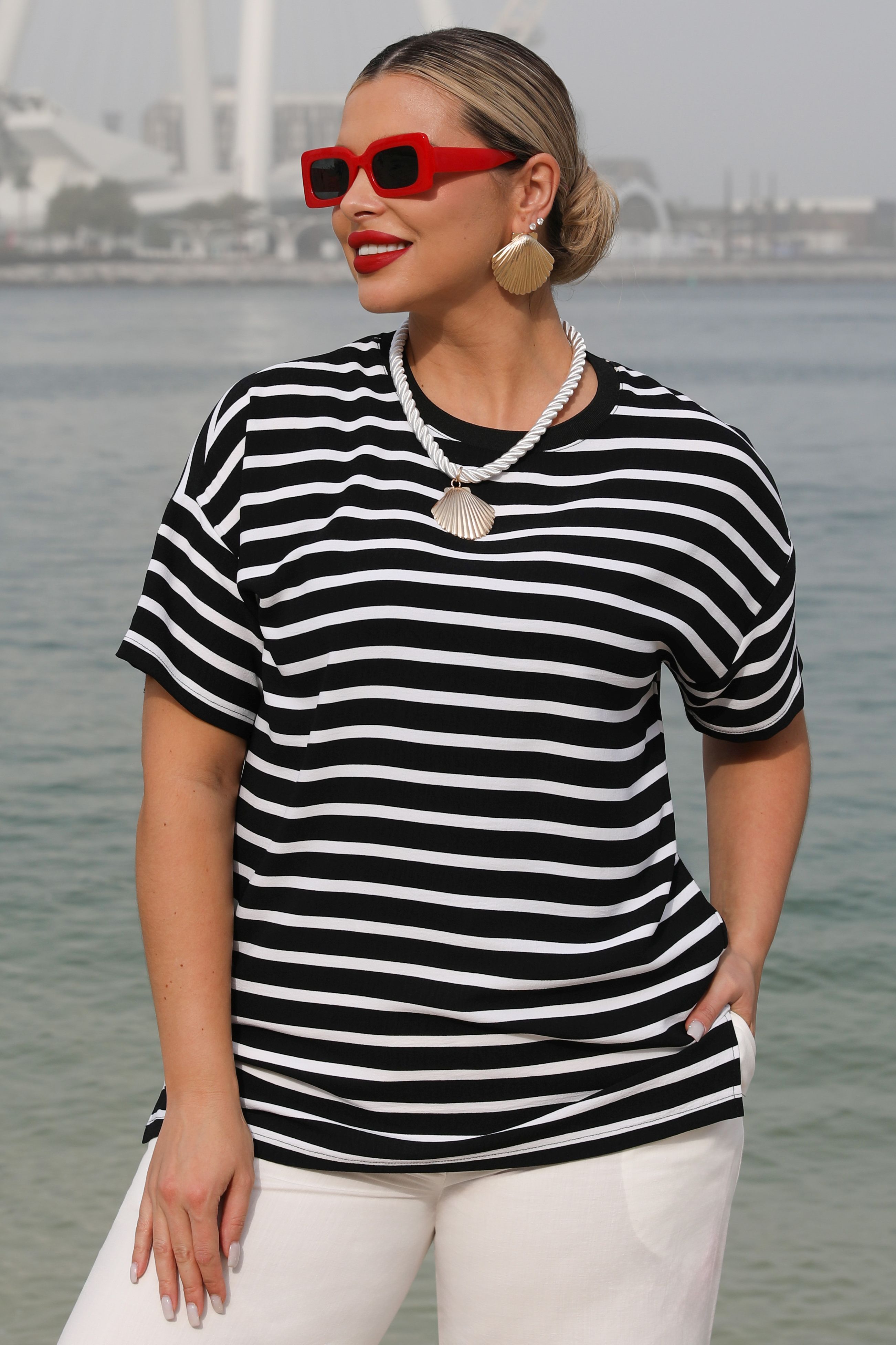 Блузка в чёрно-белую полоску Dora